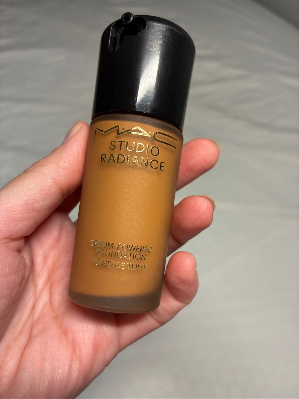 MAC Cosmetics Studio Radiance Foundation — Warm Tan Bottle